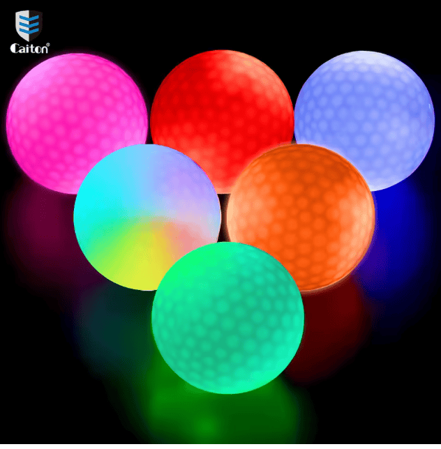 Sechs leuchtende LED-Golfbälle: Pink, Rot, Blau, Orange, Grün und Regenbogen